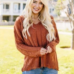Rust colored distressed sweater